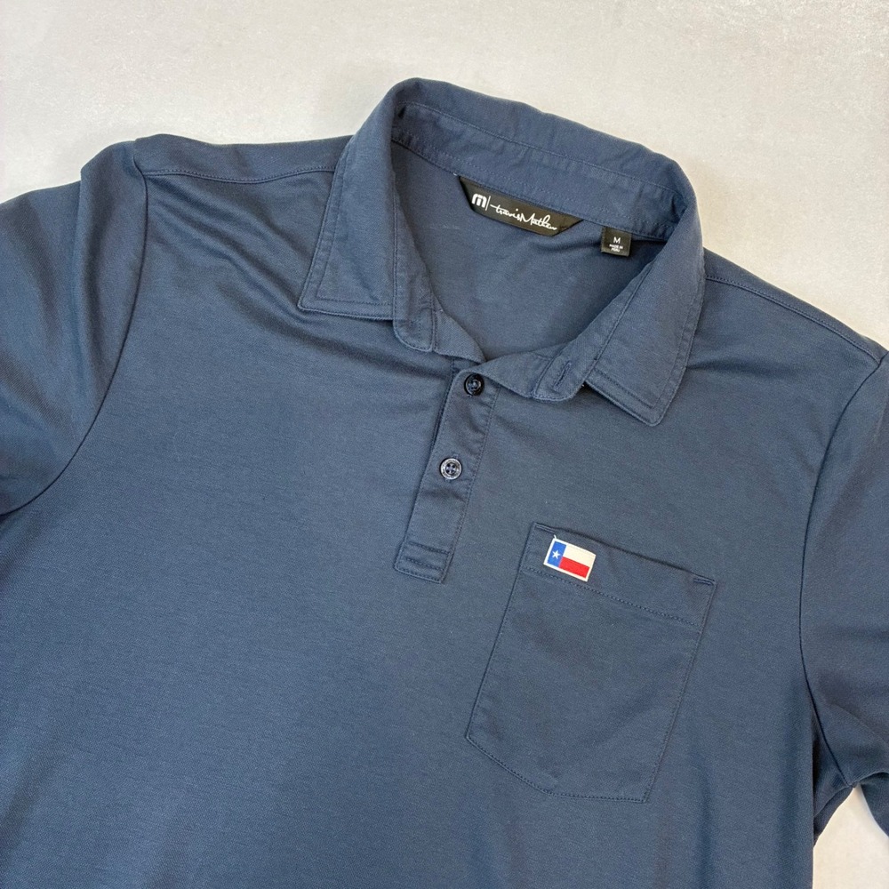 TravisMathew Polo Shirt Mens Medium Navy Blue Texas Flag Pocket Golf Casual